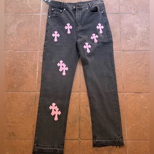 Chrome hearts black jeans with pink crosses
